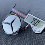 The MERCEDES BENZ 4-Piece Silver 75mm/2.95-inch wheel center cover fits most models - Image 2